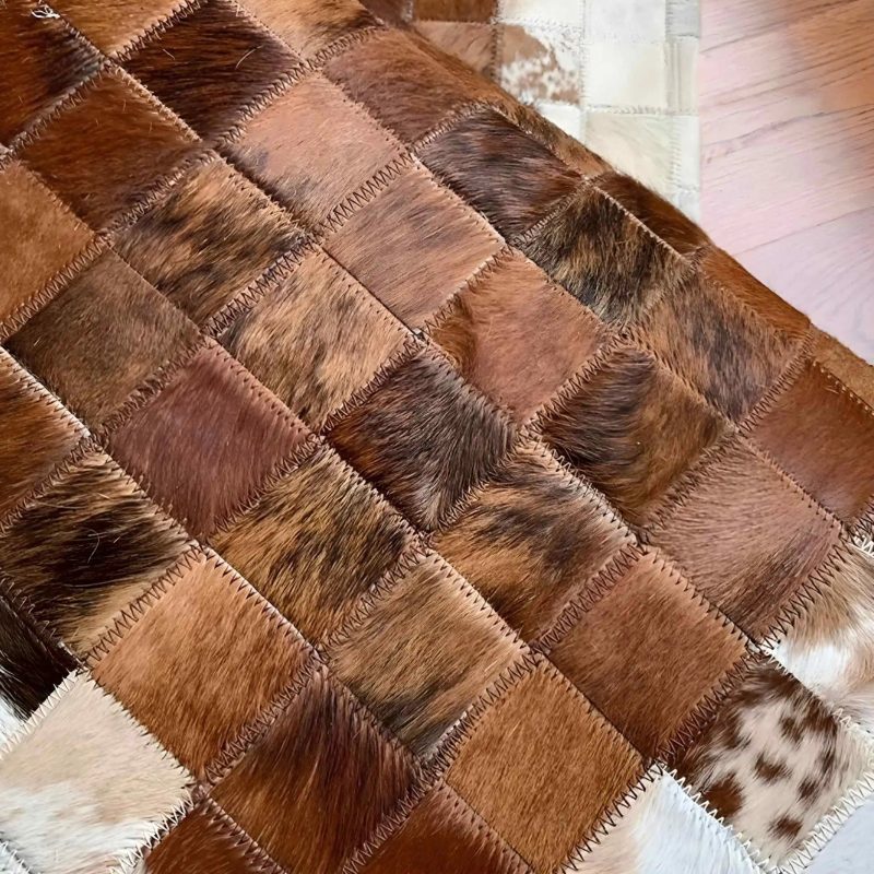 White and Brown Cowhide Rectangular Carper on Detail